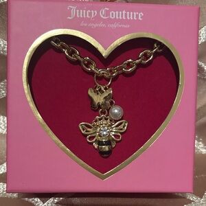 Juicy Couture Necklace with Butterfly and Bee Charms (retails at $100)